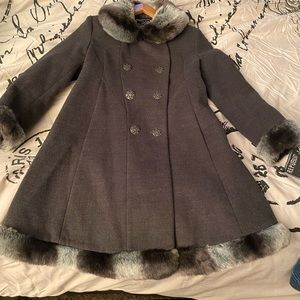 This is aGray dress coat with gray and white fur